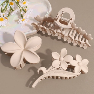 Matte beige plumeria flower hair claws set for women in elegant minimalist design
