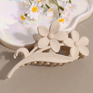 Matte beige plumeria flower claw clip with resin leaf design for women hair accessory