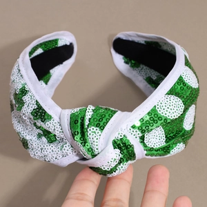 Cerchietto annodato con paillettes verdi e bianche per accessorio capelli San Patrizio