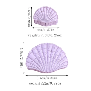 Detailed view of lavender shell hair claws with dimensions and weights for two sizes