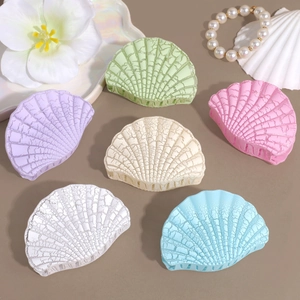 Shell shaped hair claw clips with cracked texture in six colors for elegant hairstyles