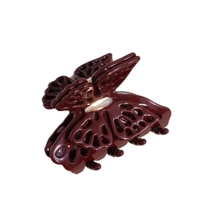 Eleganter hohler Schmetterling Haarklammer in Weinrot mit goldener Metallfeder für Damen