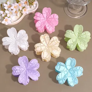 Floral hair claw clips with crackle texture in assorted pastel colors for women