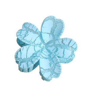 Light blue flower hair claw clip with vintage crackle texture for vacation hairstyles