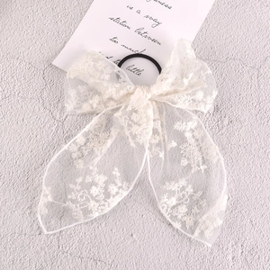 Elegant white lace bow hair tie with floral embroidery and long chiffon ribbons