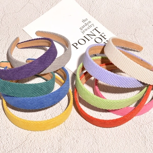Colorful corduroy striped headbands for women in various vibrant candy colors