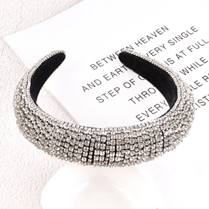 Close-up of luxury wide bridal headband featuring multi-row rhinestones and velvet lining