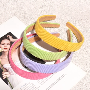 Set of four corduroy wide headbands in yellow, green, purple, and pink candy colors