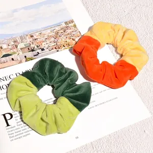 Velvet oversized scrunchies with vibrant contrast color blocks for women hairstyles