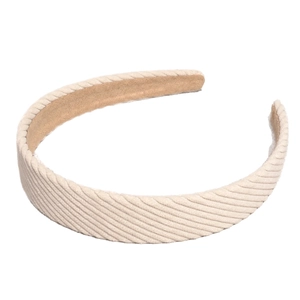 Minimalist cream white corduroy headband for women with a ribbed texture and soft lining