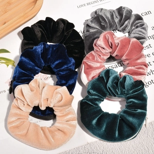 Set of 6 velvet scrunchies with hidden zipper pockets in assorted colors for hair styling