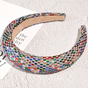 Macro shot of colorful square rhinestones on a wide sponge headband with non-slip velvet lining