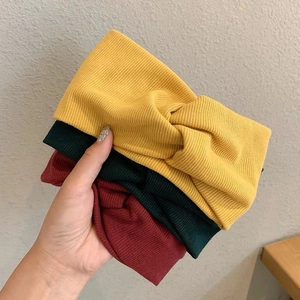 Set di tre fasce per capelli in maglia intrecciata nei colori giallo, verde e bordeaux
