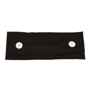 Elastic black wide yoga headband with white buttons for face masks on white background