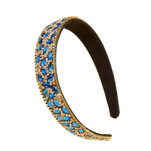 Baroque leaf headband with blue rhinestones and gold beads on a wide padded band