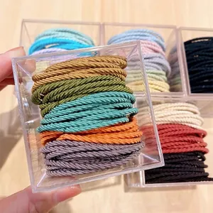 Colorful high elasticity spiral hair ties in a transparent storage box for women