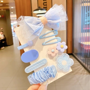 Set di 8 fermagli blu per capelli con fiocchi e fiori per bambine su scheda