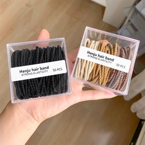 Pack of 50 durable high-elasticity hair bands in earth tones and black with acrylic box