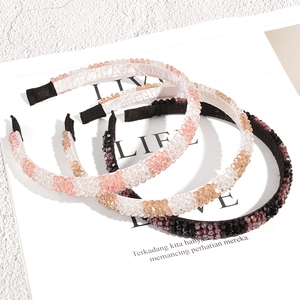 Three-piece set of handmade crystal beaded headbands in pink, champagne, and black purple