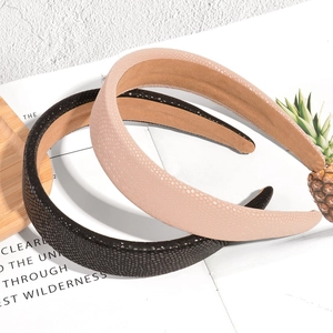 Classic wide padded headband set in black and beige faux leather with non-slip lining