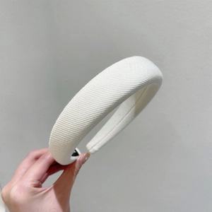 Padded white sponge headband for women with soft twill fabric and non-slip inner lining