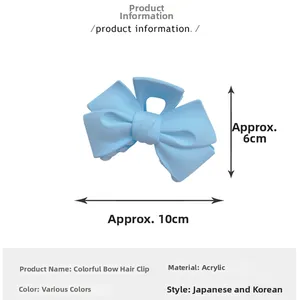 Détail de la pince à cheveux nœud bleu clair avec dimensions précises de 10 cm x 6 cm