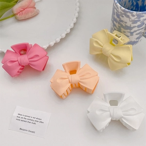 Pinces à cheveux élégantes en forme de nœud aux couleurs pastel avec fleurs décoratives