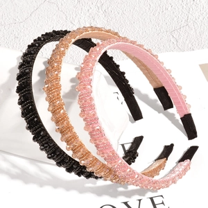 Three-piece set of handmade beaded rhinestone headbands in black, champagne, and pink colors