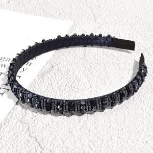 Detail view of navy blue beaded headband showing exquisite multi-row crystal rhinestones