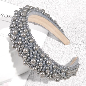 Detail of grey sponge headband with full faux pearl inlay and velvet inner lining