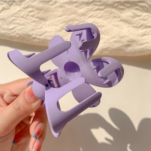 Matte purple flower hair claw clip for girls with elegant five-petal blossom design