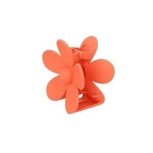 Elegant matte coral orange flower hair claw clip with a minimalist six-petal design