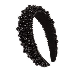 Padded black sponge headband featuring various sizes of elegant black pearls