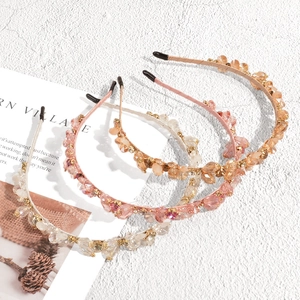 Elegant crystal rhinestone headband set in champagne pink and white for women