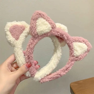 Plush cat ear headband set in pink and beige white for cute hair styling and makeup