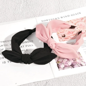 Fashionable knotted bow headband set in black and pink fabric for women hair styling