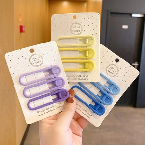 Set di 3 fermagli ovali opachi per capelli a becco d'anatra in giallo, blu e viola