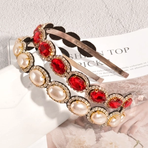 Vintage style headband featuring oval red gemstone and cream pearl with rhinestones