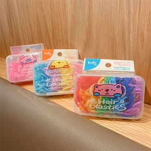 Three boxes of colorful jelly hair elastics for kids in transparent cases with cute animals
