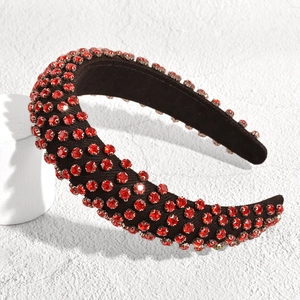 Padded black velvet headband with sparkling red rhinestones in a chic French style
