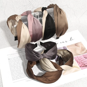 Elegant satin cross-knot wide headbands in multiple colors with silky texture finish