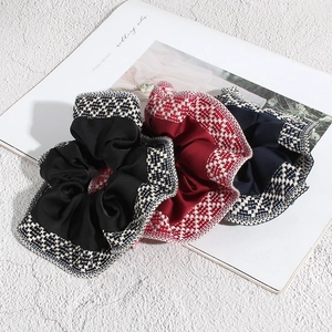 Three-piece bohemian scrunchie set in black, red, and navy with tweed trim details