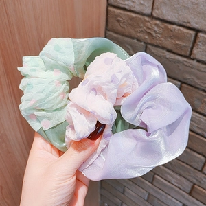 Three-piece chiffon scrunchie set in pastel mint, pink, and lilac with pearl finish