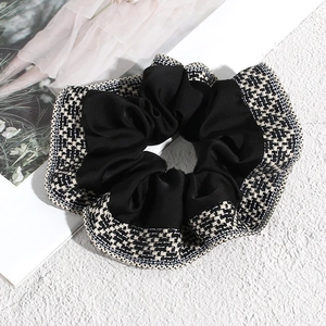 Bohemian oversized scrunchie featuring black satin and houndstooth tweed pattern design