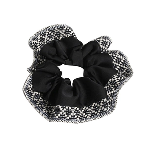 Ethnic bohemian scrunchie in black satin and black-white tweed fabric for hair styling
