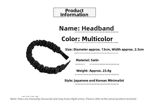 Detail view of black pleated satin headband with dimensions 13cm diameter and 2.5cm width