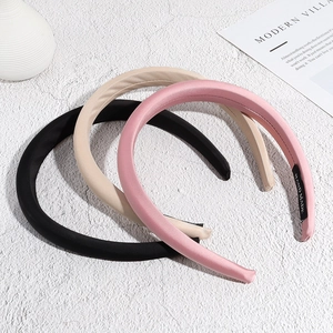 Three-piece set of satin sponge headbands in black, beige, and pink colors