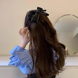 Elegant French satin black bow hair clip with white piping for women's hairstyles