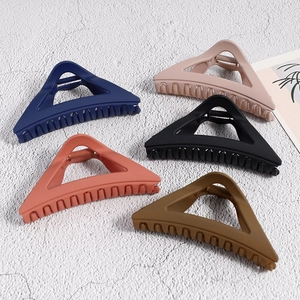 Matte finish large triangle hair claws in multiple Morandi colors with metal springs