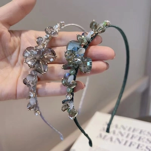 Baroque style crystal beaded flower headband set with silver and dark green sparkling gems